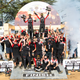 Sébastien Ogier and his team celebrate their 2021 Safari Rally win.